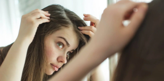 Why your hair is oily at the roots but dry at the ends